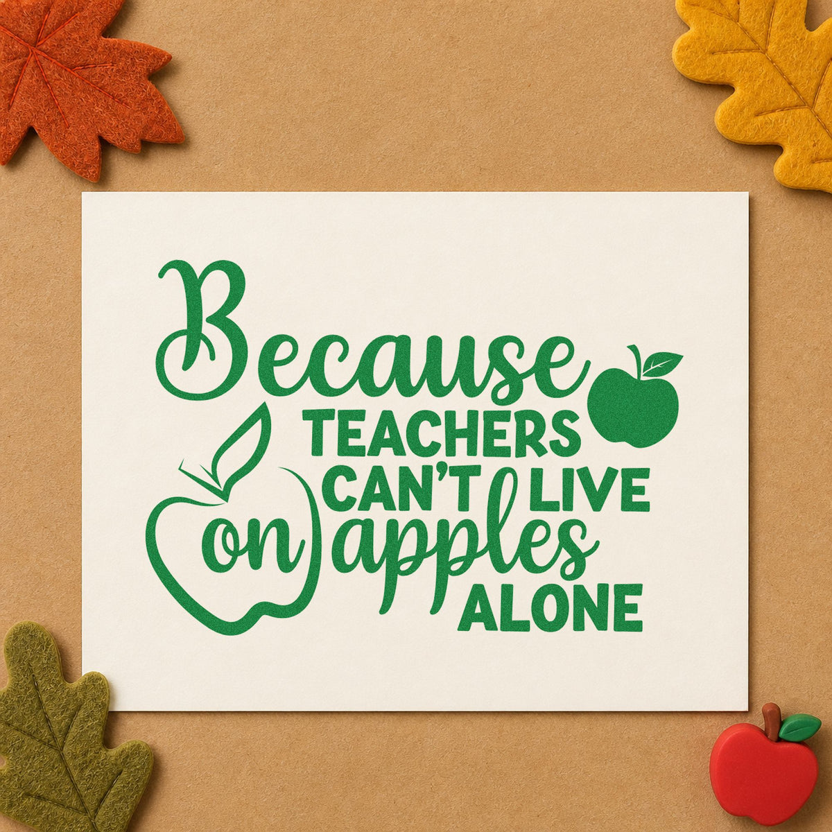 Teachers Can't Live on Apples craft stamp imprint in green ink on a handmade project, one idea being potluck sign pages.