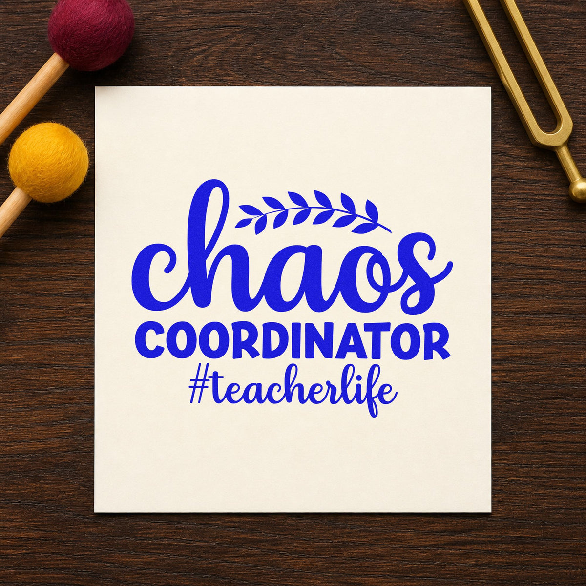 Chaos Coordinator Teacher Life craft stamp in blue ink on cardstock, an easy option for backdrop cloth panels.
