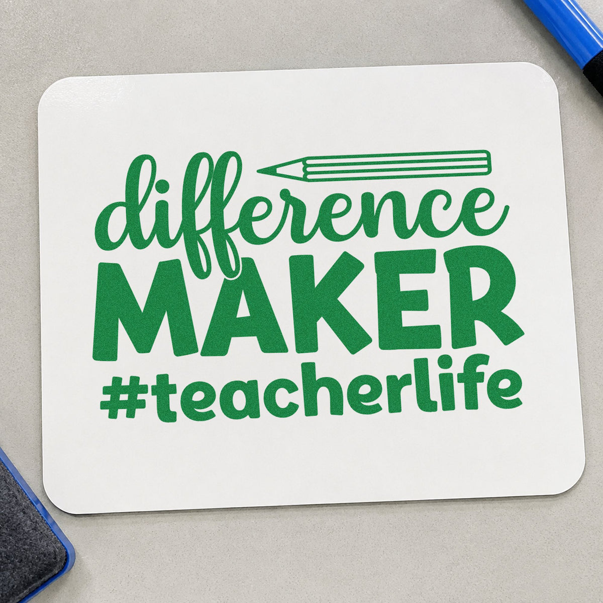 Difference Maker Teacher Life craft stamp imprint in green ink on a handmade project, one idea being kudos slip pages.