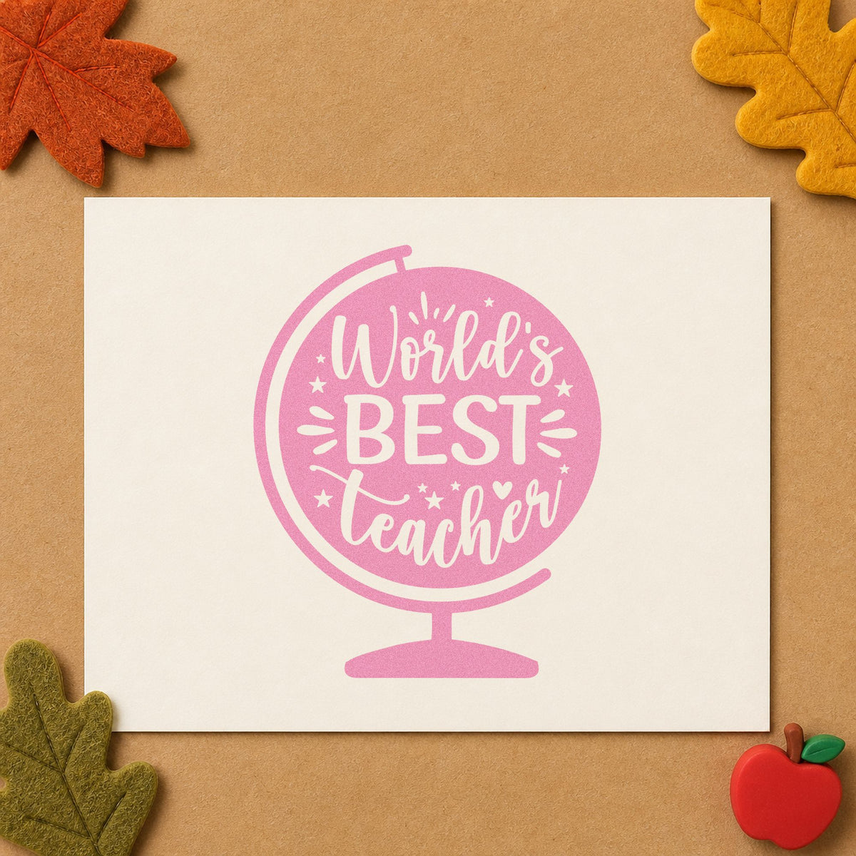 World's Best Teacher Globe craft stamp in purple ink on cardstock, an easy option for award base tags.