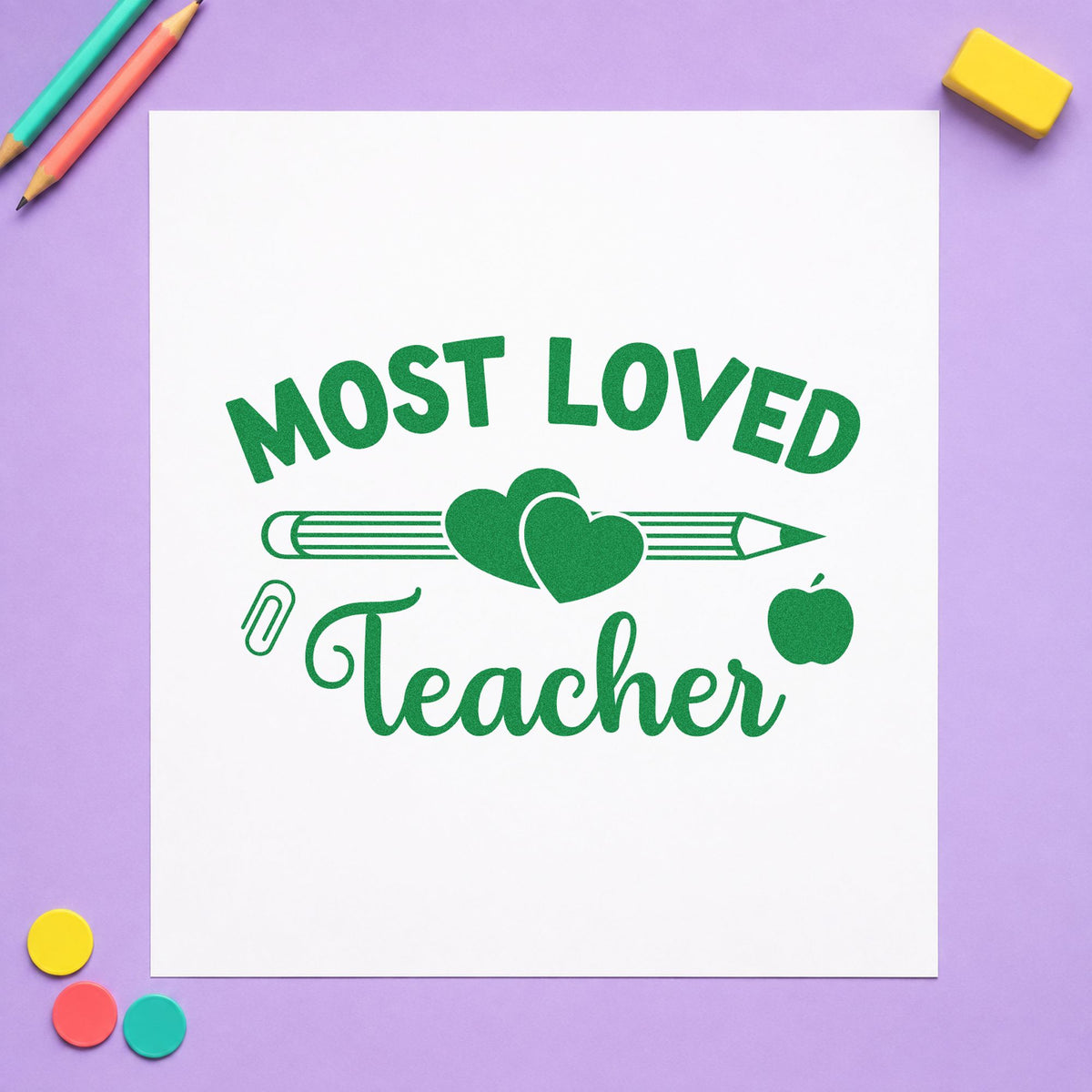 Most Loved Teacher craft stamp imprint in green ink on a handmade project, one idea being framed class photo.