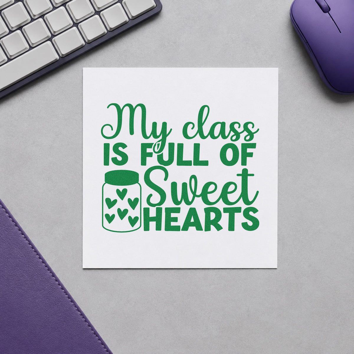 My Class Is Full of Sweethearts craft stamp imprint in green ink on a handmade project, one idea being compliment slip pages.