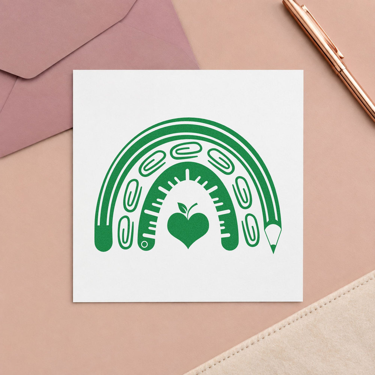 School Supply Rainbow craft stamp imprint in green ink on a handmade project, one idea being framed reading arch.