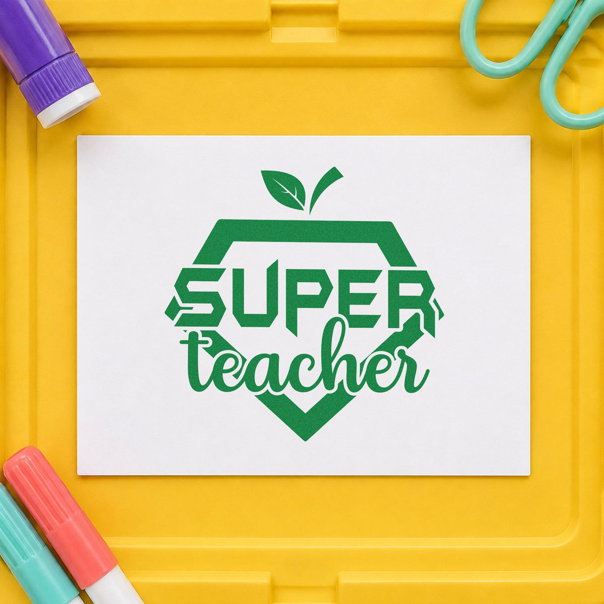Super Teacher Shield craft stamp imprint in green ink on a handmade project, one idea being framed trophy case.