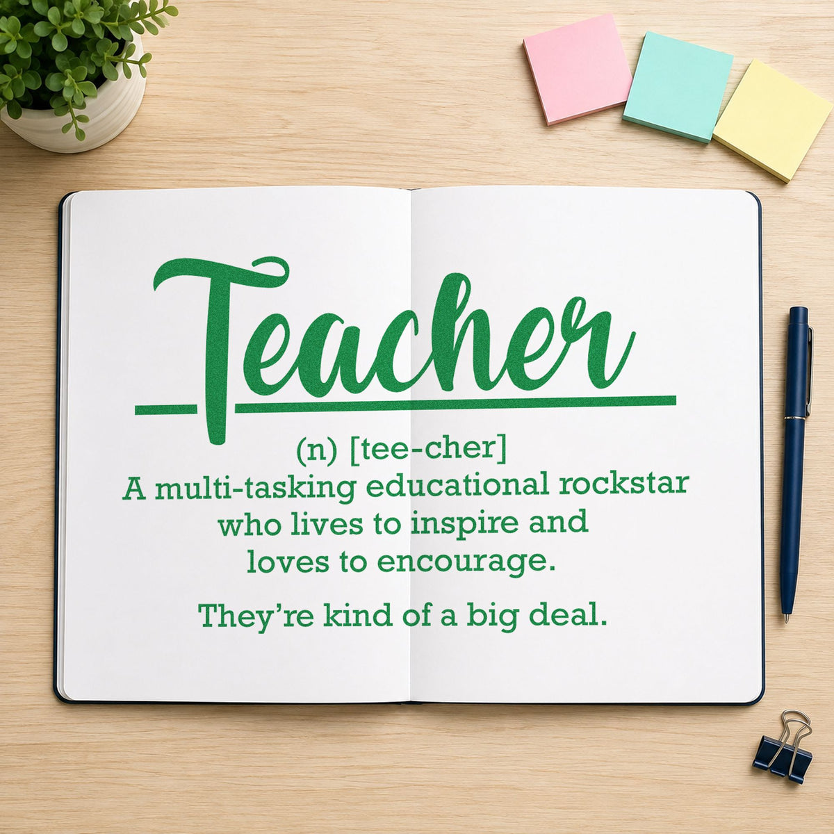 Teacher Definition craft stamp imprint in green ink on a handmade project, one idea being framed library nook.