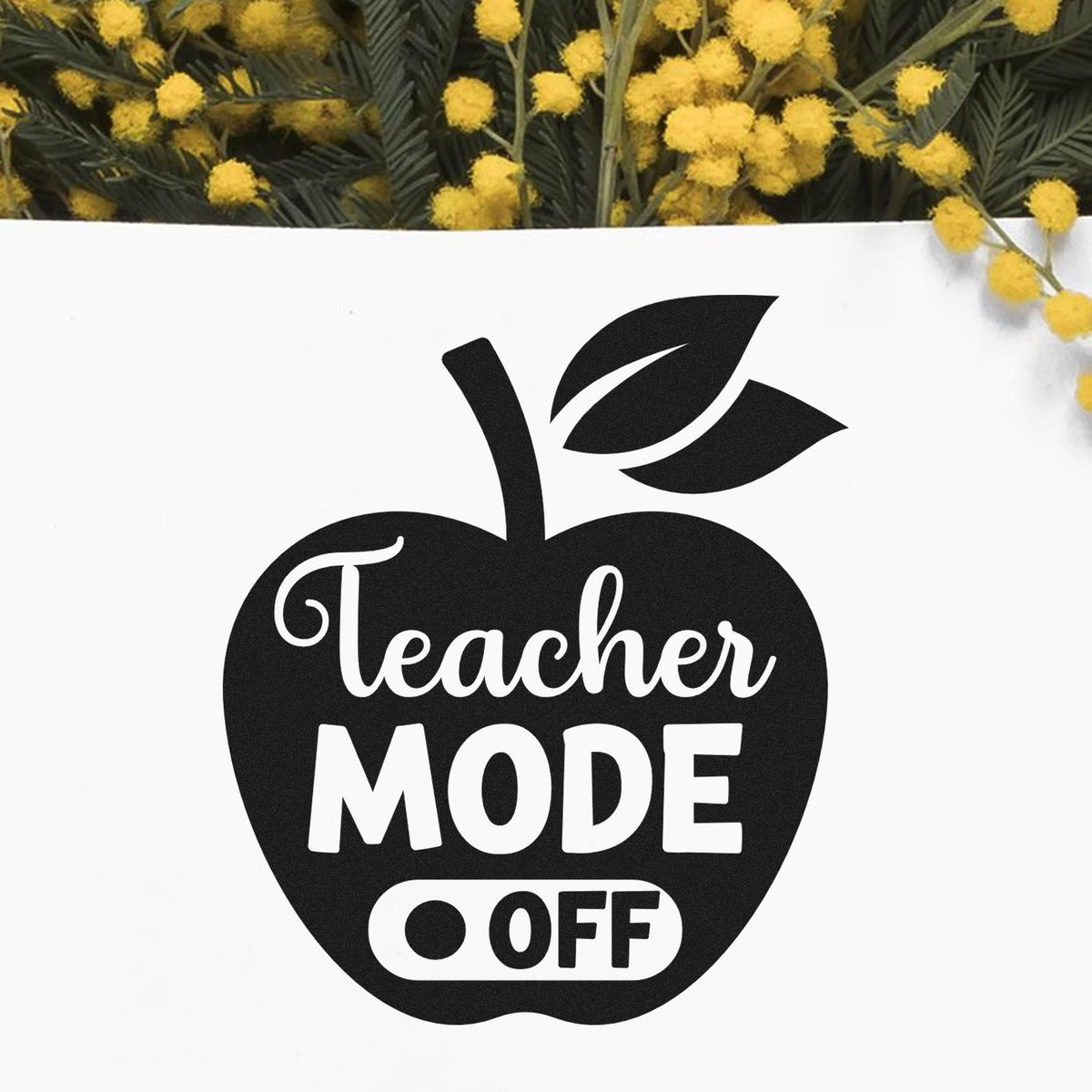 Teacher Mode Off Apple Premium Wooden Stamp - Vintage Pro imprint stamped in black ink. A solid apple contains "Teacher mode" and an off-switch symbol.