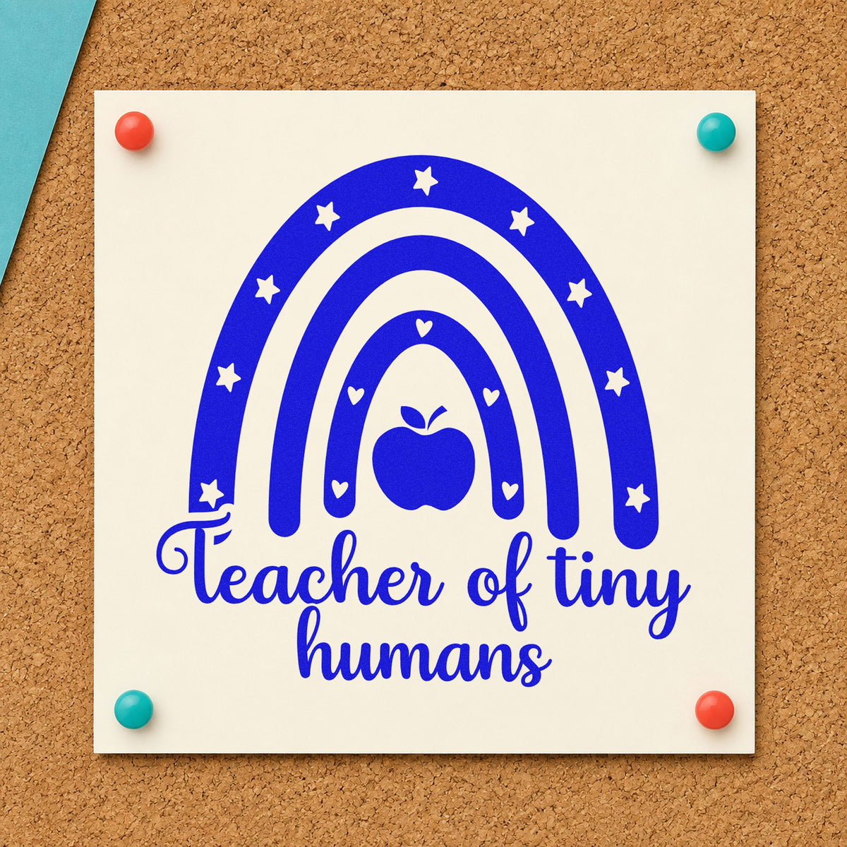 Teacher of Tiny Humans Rainbow craft stamp in blue ink on cardstock, an easy option for play mat panels.