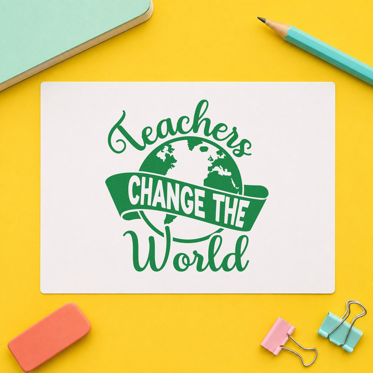 Teachers Change the World Banner craft stamp imprint in green ink on a handmade project, one idea being framed atlas corner.