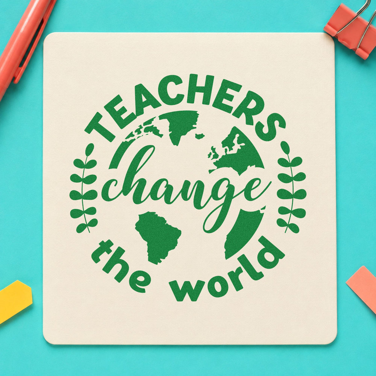 Teachers Change World Globe craft stamp imprint in green ink on a handmade project, one idea being framed greenhouse wall.
