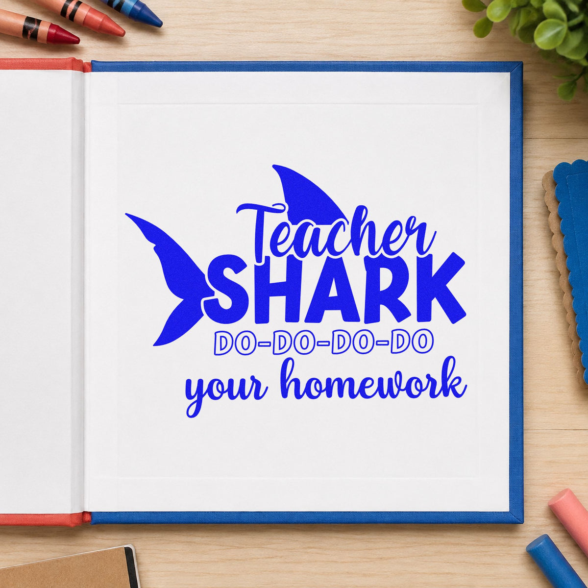 Teacher Shark Homework craft stamp imprinted in blue ink on paper, a design suited to ocean unit seals.