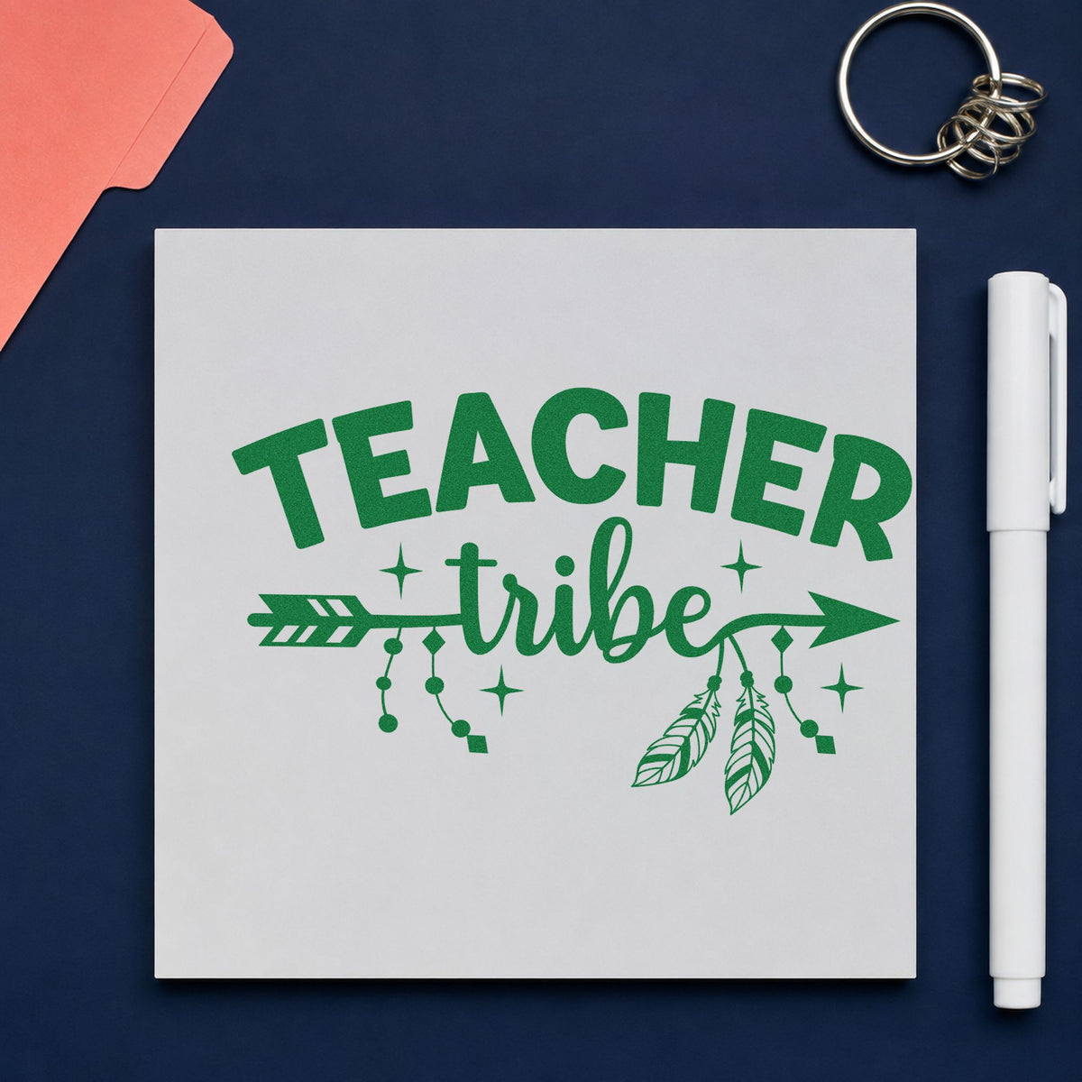 Teacher Tribe Arrow craft stamp imprint in green ink on a handmade project, one idea being roster sheet pages.