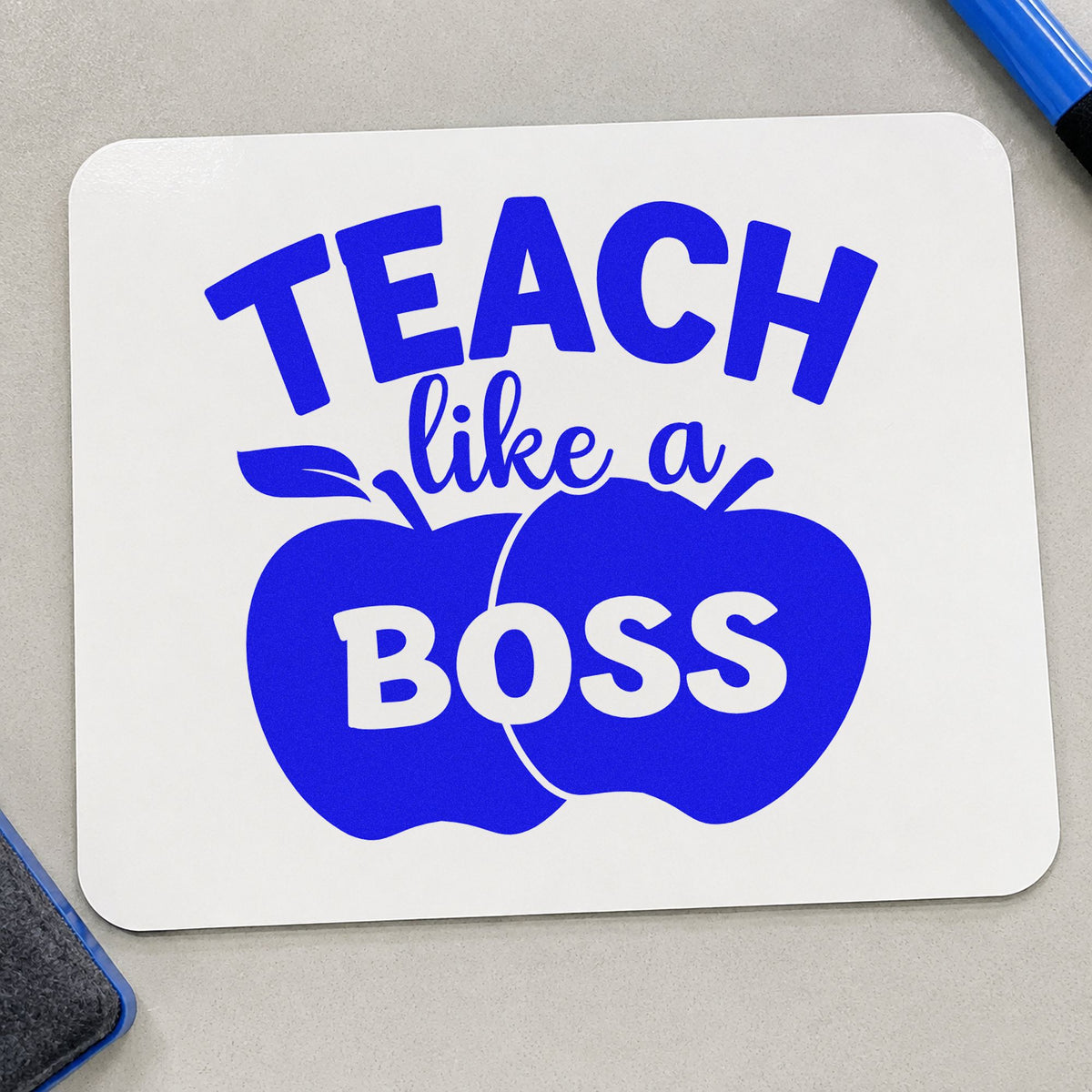 Teach Like a Boss Apples craft stamp in blue ink on cardstock, an easy option for blazer pocket panels.