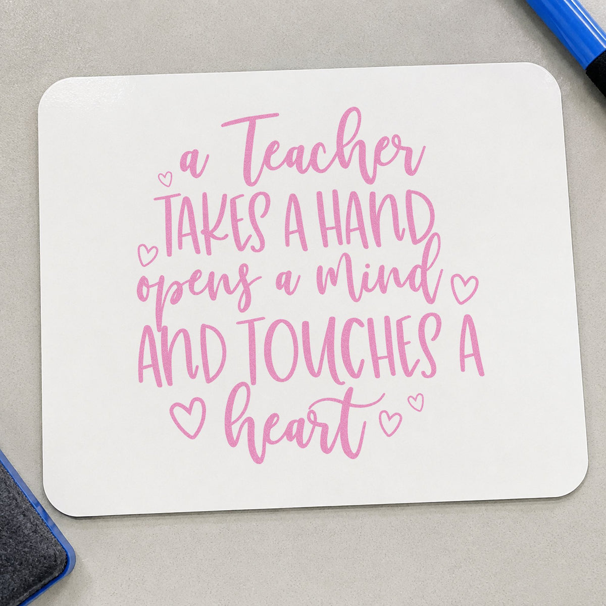 Teacher Takes a Hand craft stamp in purple ink on cardstock, an easy option for support staff tags.
