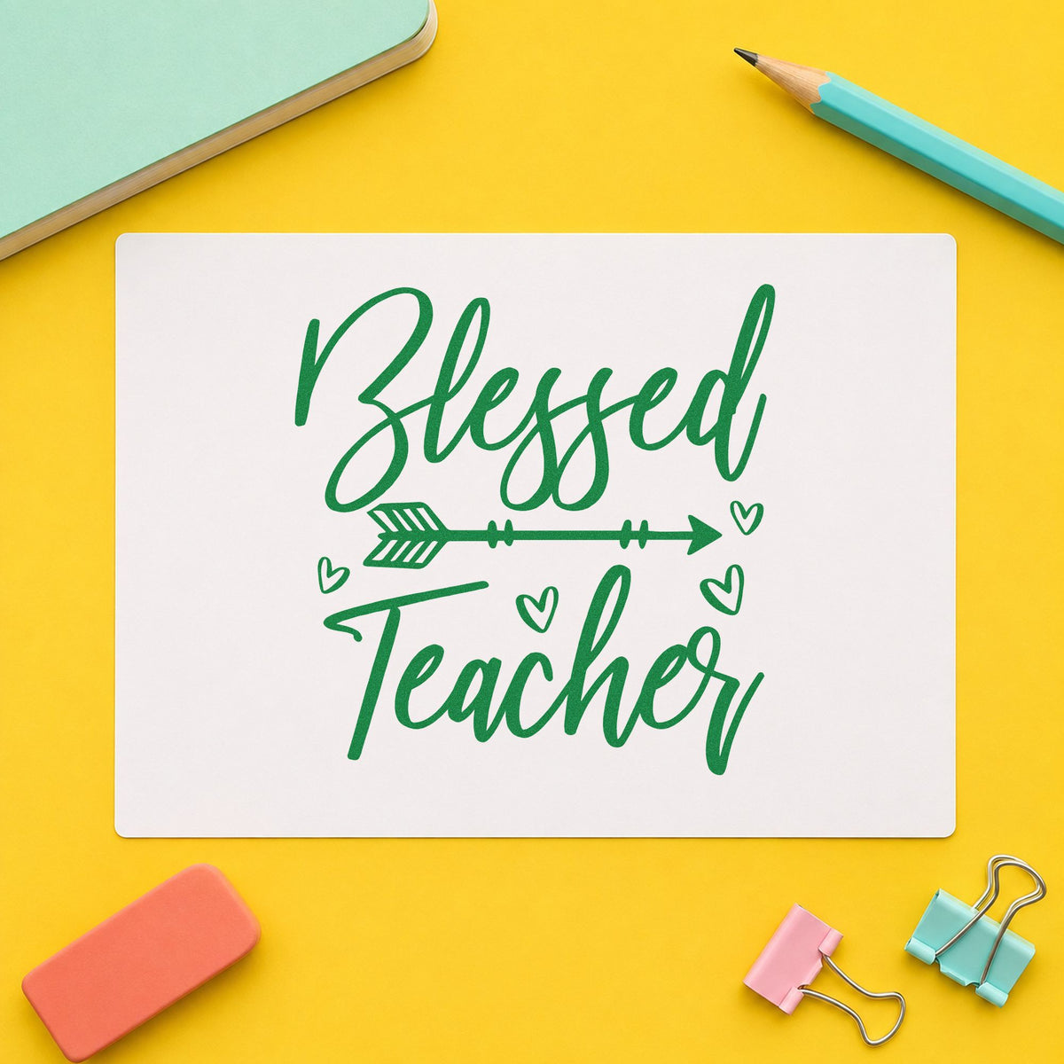 Blessed Teacher Feather Arrow craft stamp imprint in green ink on a handmade project, one idea being coloring heart pages.