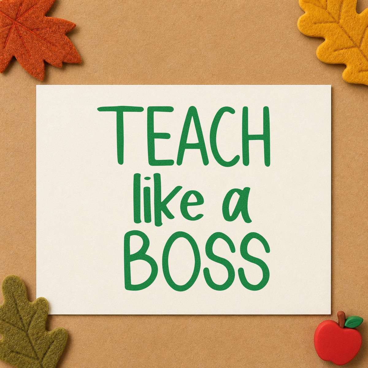 Teach Like a Boss Block craft stamp imprint in green ink on a handmade project, one idea being type study pages.