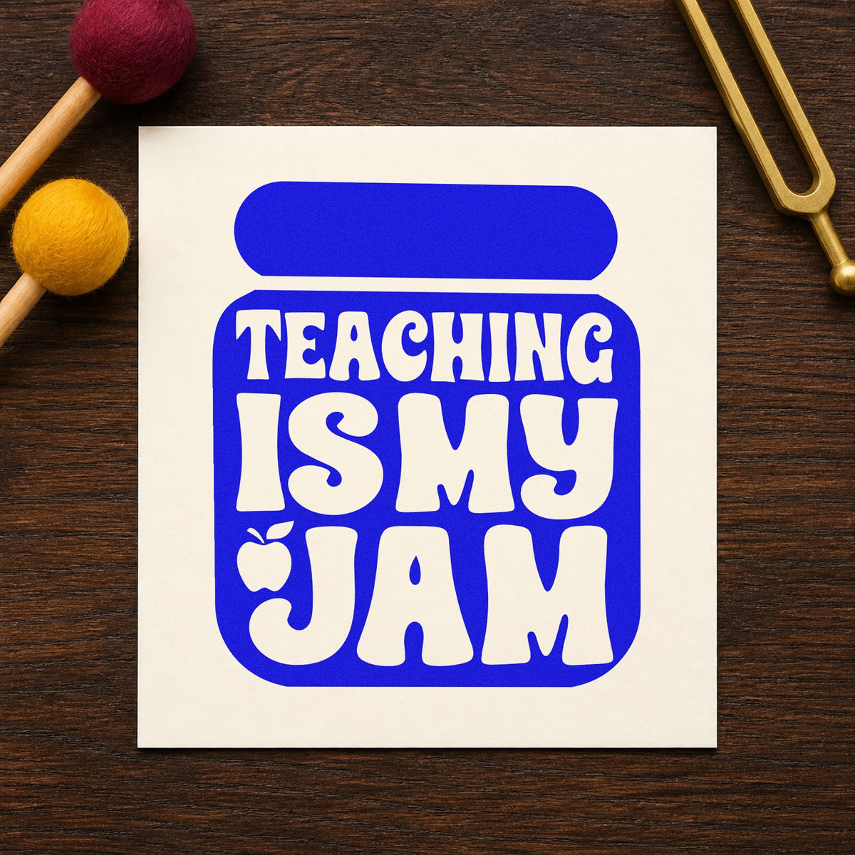 Teaching Is My Jam Solid Jar craft stamp in blue ink on cardstock, an easy option for black apron panels.