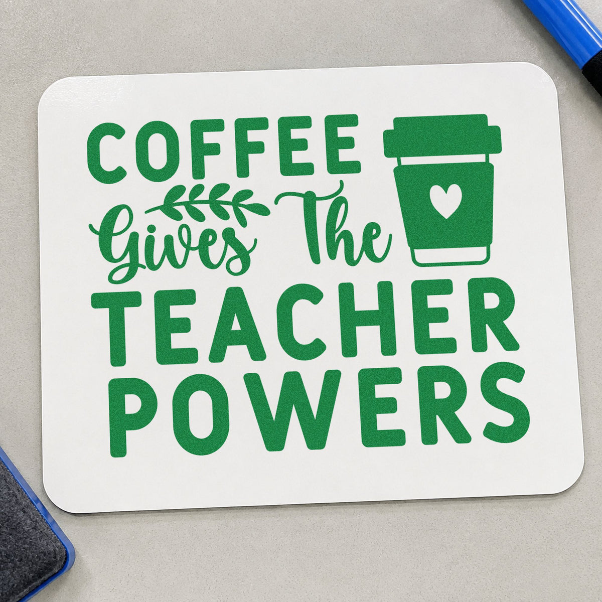 Coffee Gives Teacher Powers Block craft stamp imprint in green ink on a handmade project, one idea being roast note pages.