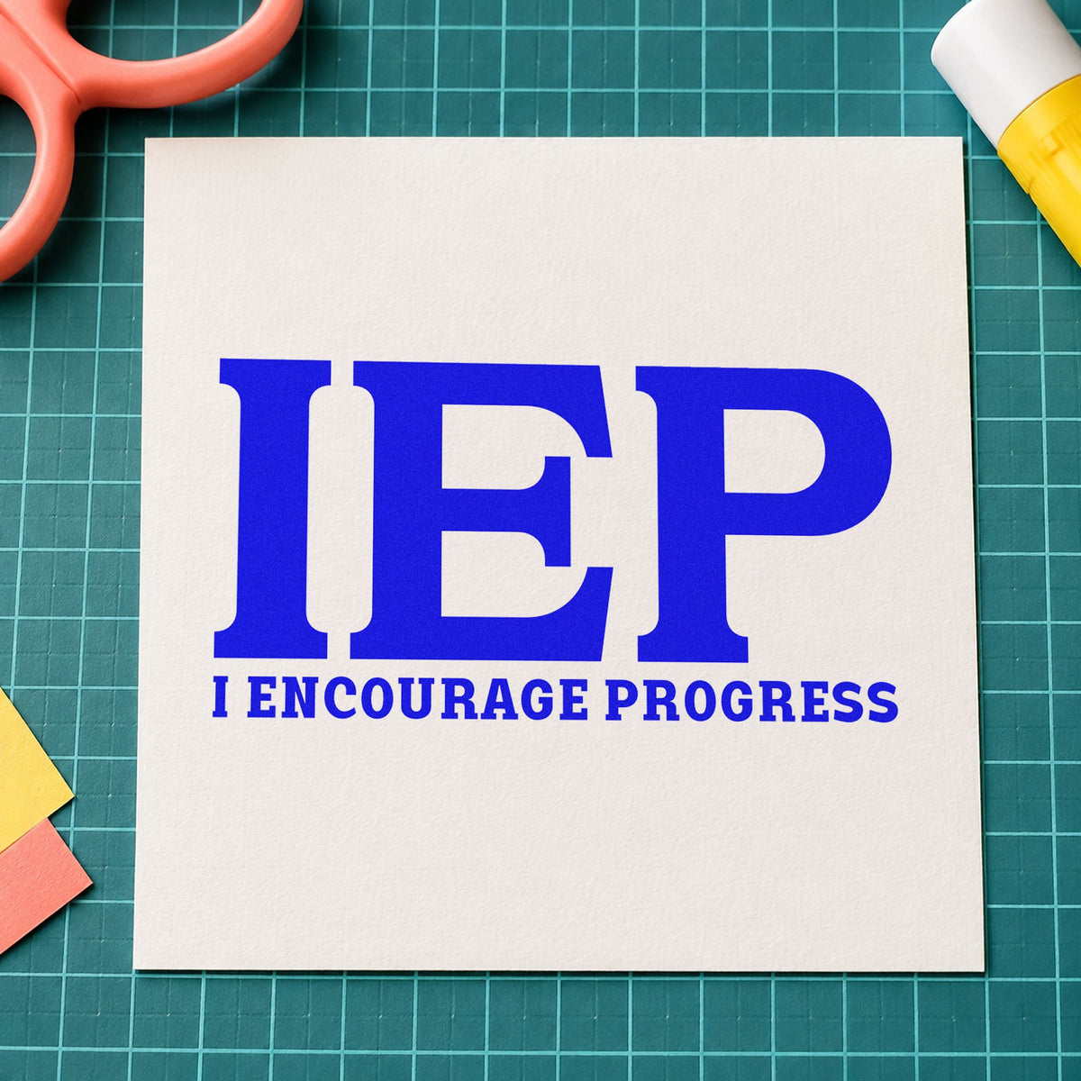 IEP I Encourage Progress craft stamp in blue ink on cardstock, an easy option for tabard chest panels.