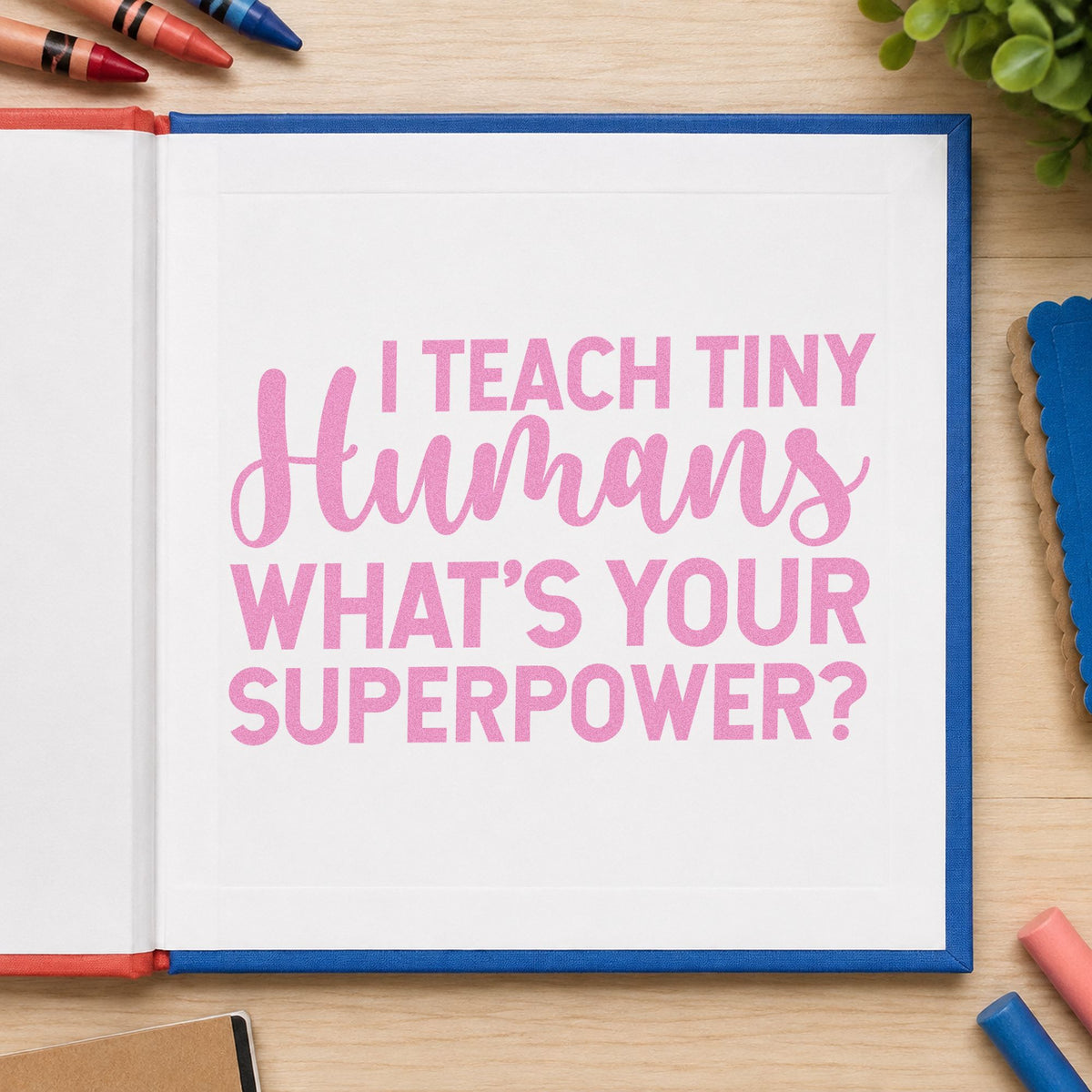 I Teach Tiny Humans craft stamp in purple ink on cardstock, an easy option for nursery gift tags.