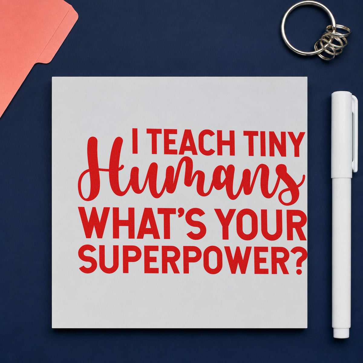 I Teach Tiny Humans rubber stamp shown in red ink, stamped for projects such as first day notes.