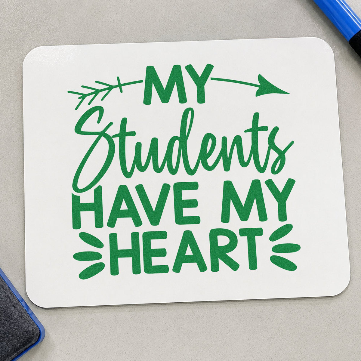 Students Have My Heart craft stamp imprint in green ink on a handmade project, one idea being class photo pages.