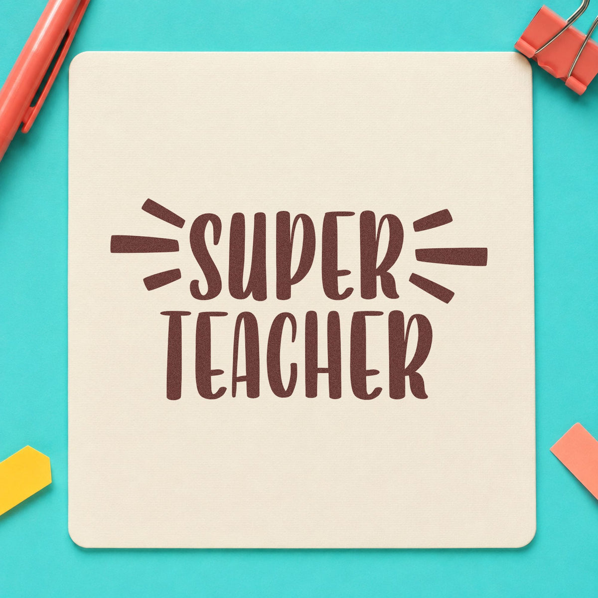Super Teacher Bold Lettering rubber stamp printed in brown ink, ready for star jar labels and similar paper crafts.