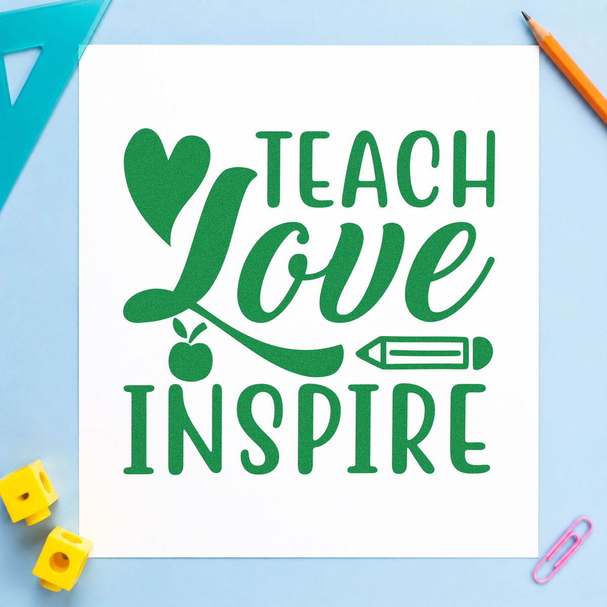 Teach Love Inspire Icons craft stamp imprint in green ink on a handmade project, one idea being framed leaving gift.