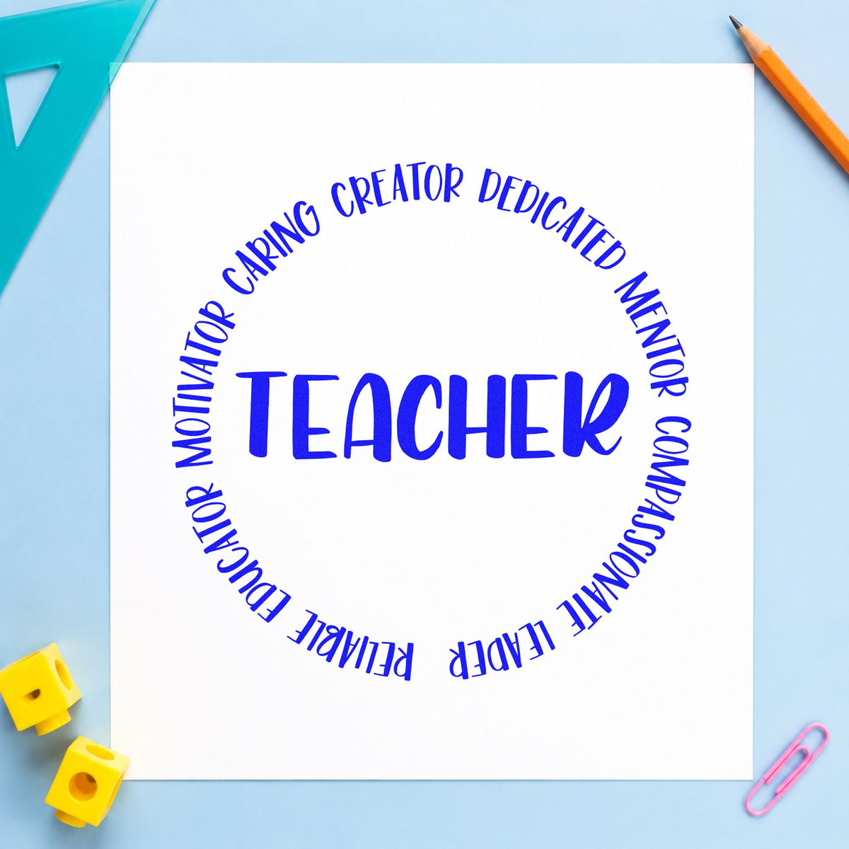 Teacher Circular Qualities craft stamp in blue ink on cardstock, an easy option for fleece chest panels.