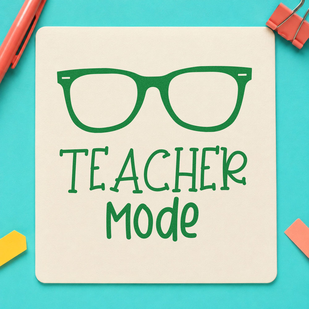 Teacher Mode Eyeglasses craft stamp imprint in green ink on a handmade project, one idea being framed desk lamp.