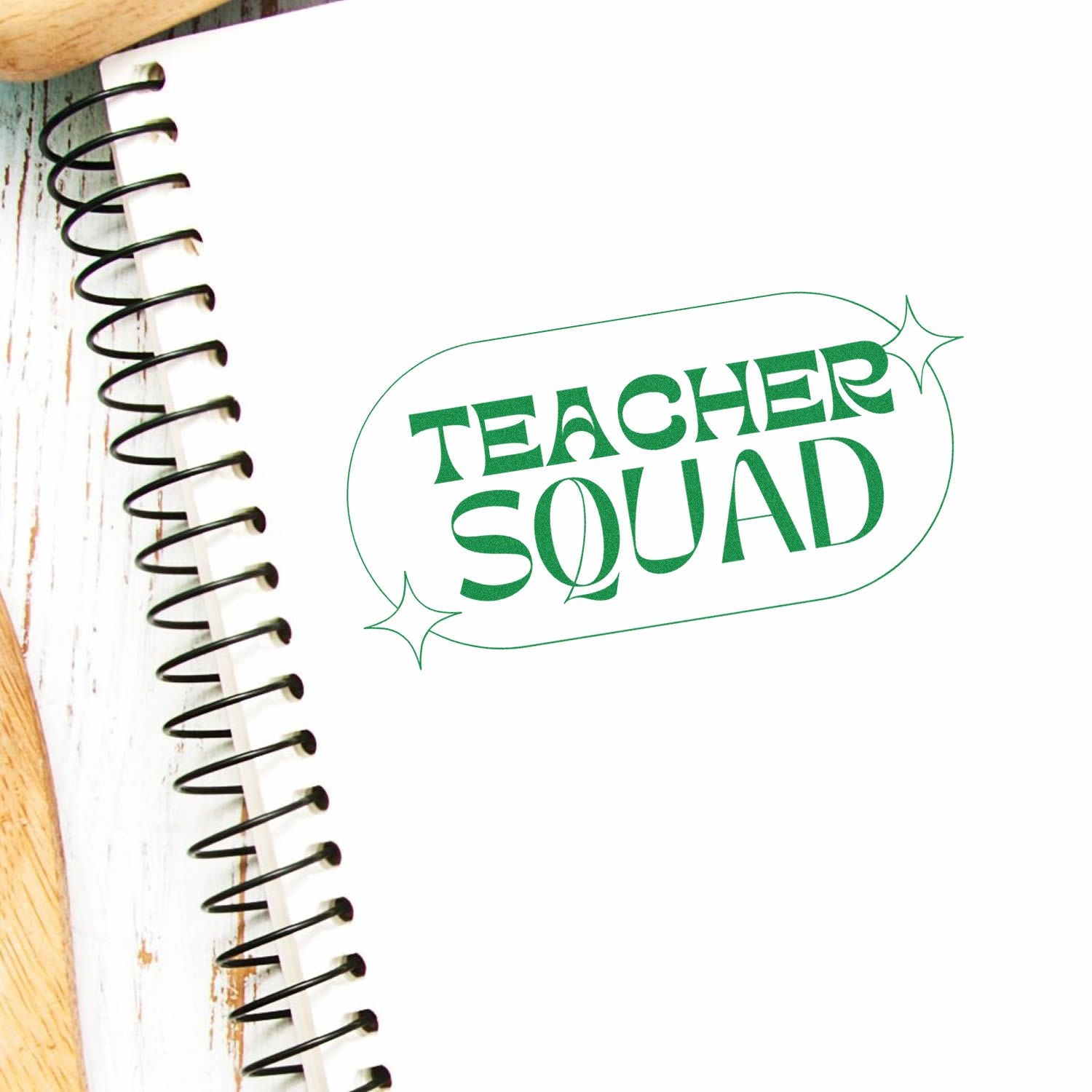 Teacher Squad rubber stamp on a notebook, ideal for classroom crafts, teacher planners, and custom school supplies.
