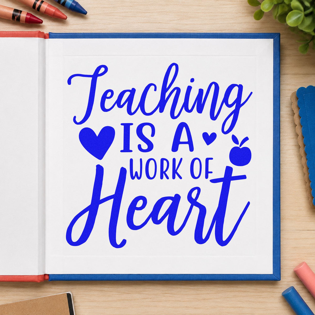 Teaching Is Work Of Heart craft stamp in blue ink on cardstock, an easy option for easel cloth panels.