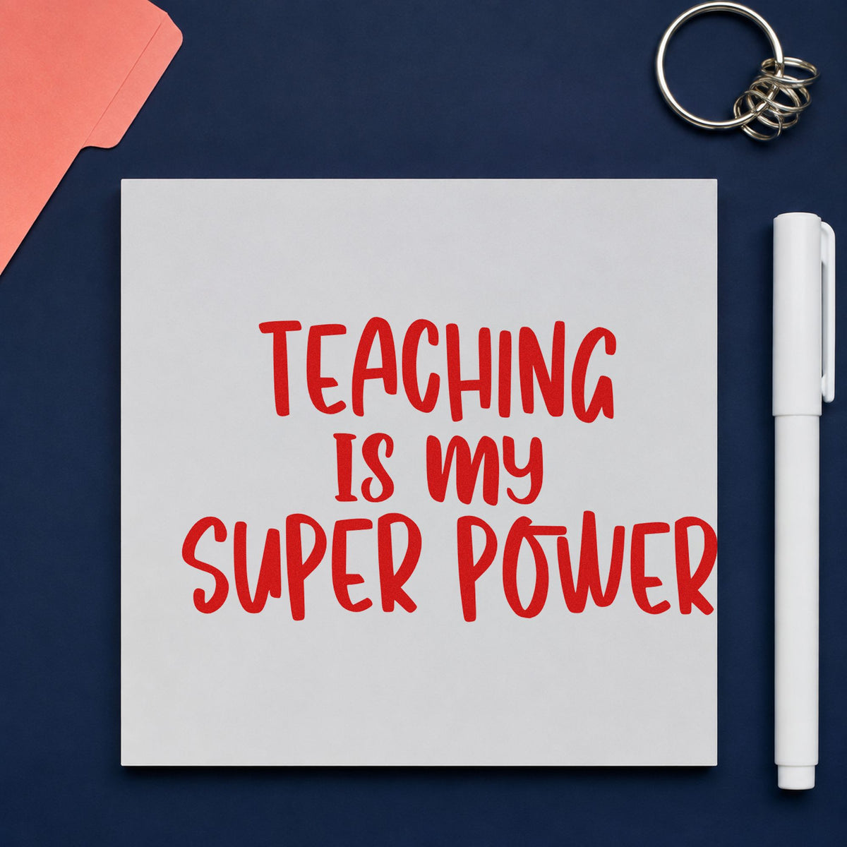 Teaching Is My Super Power rubber stamp shown in red ink, stamped for projects such as art club notes.