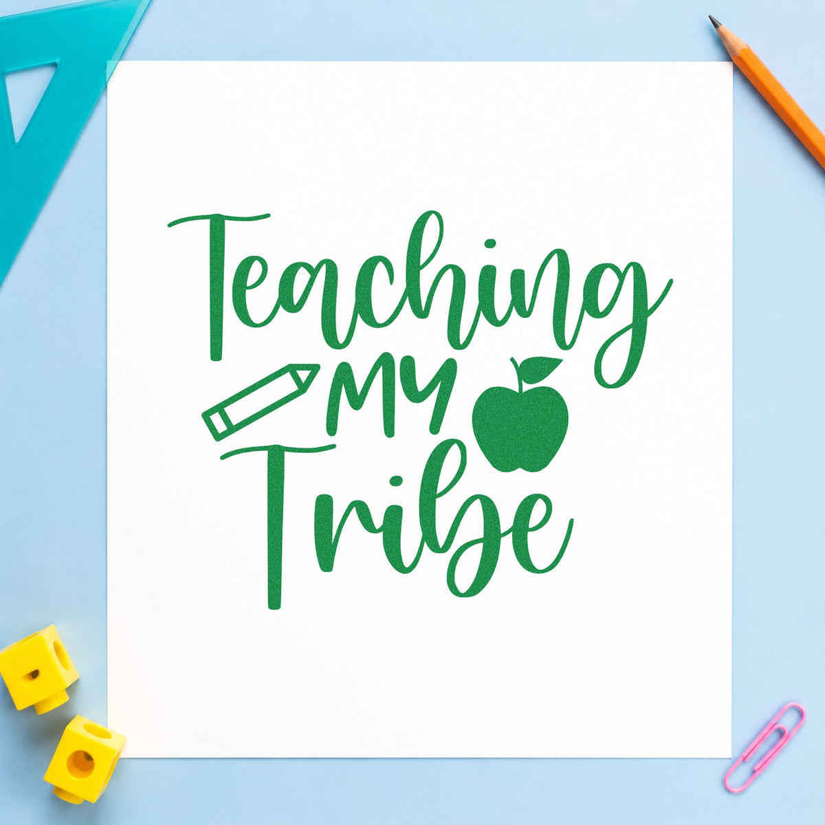 Teaching My Tribe Icons craft stamp imprint in green ink on a handmade project, one idea being register book pages.