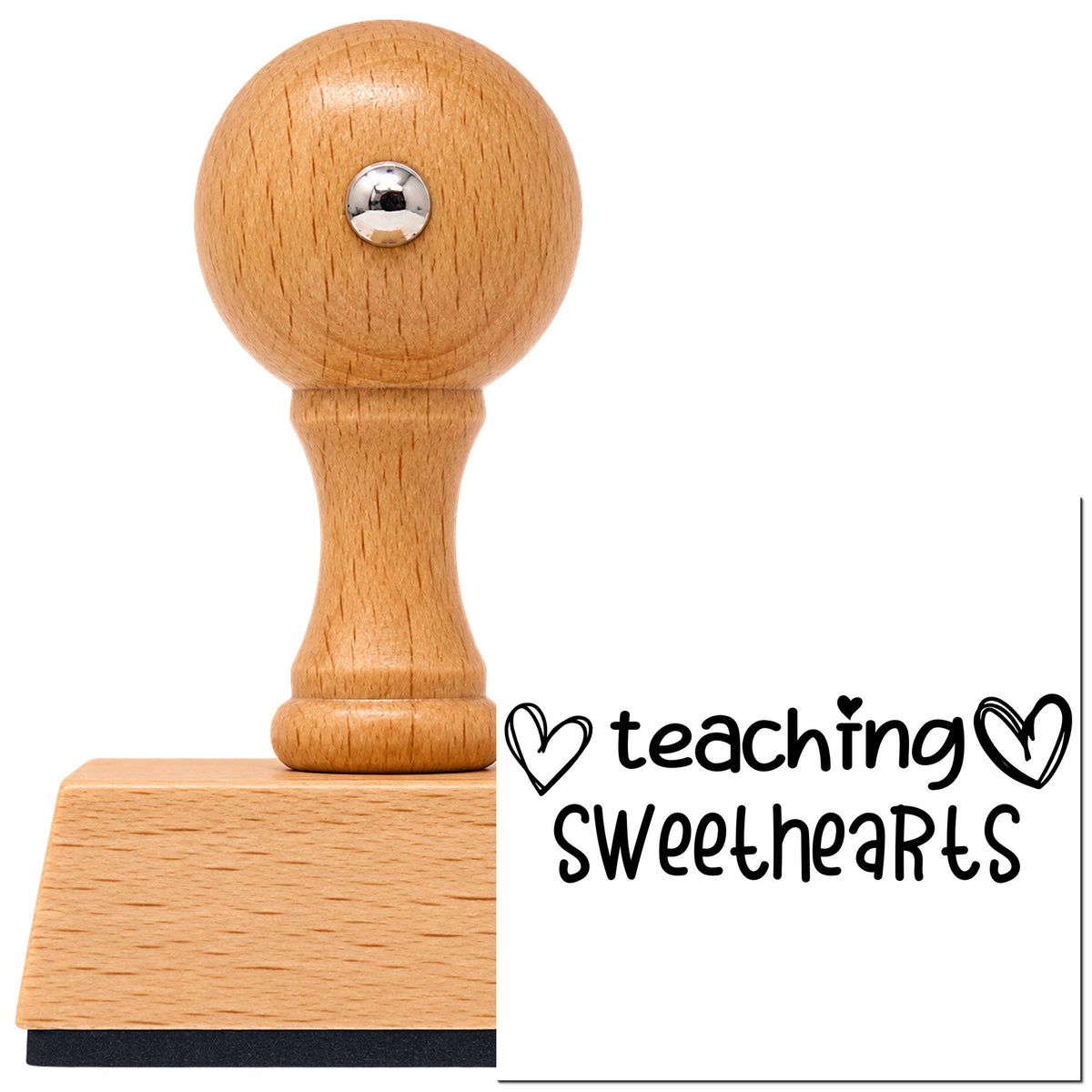Teaching Sweethearts With Hearts Vintage Pro rubber stamp in European beech wood with a round knob handle, shown beside its black imprint.