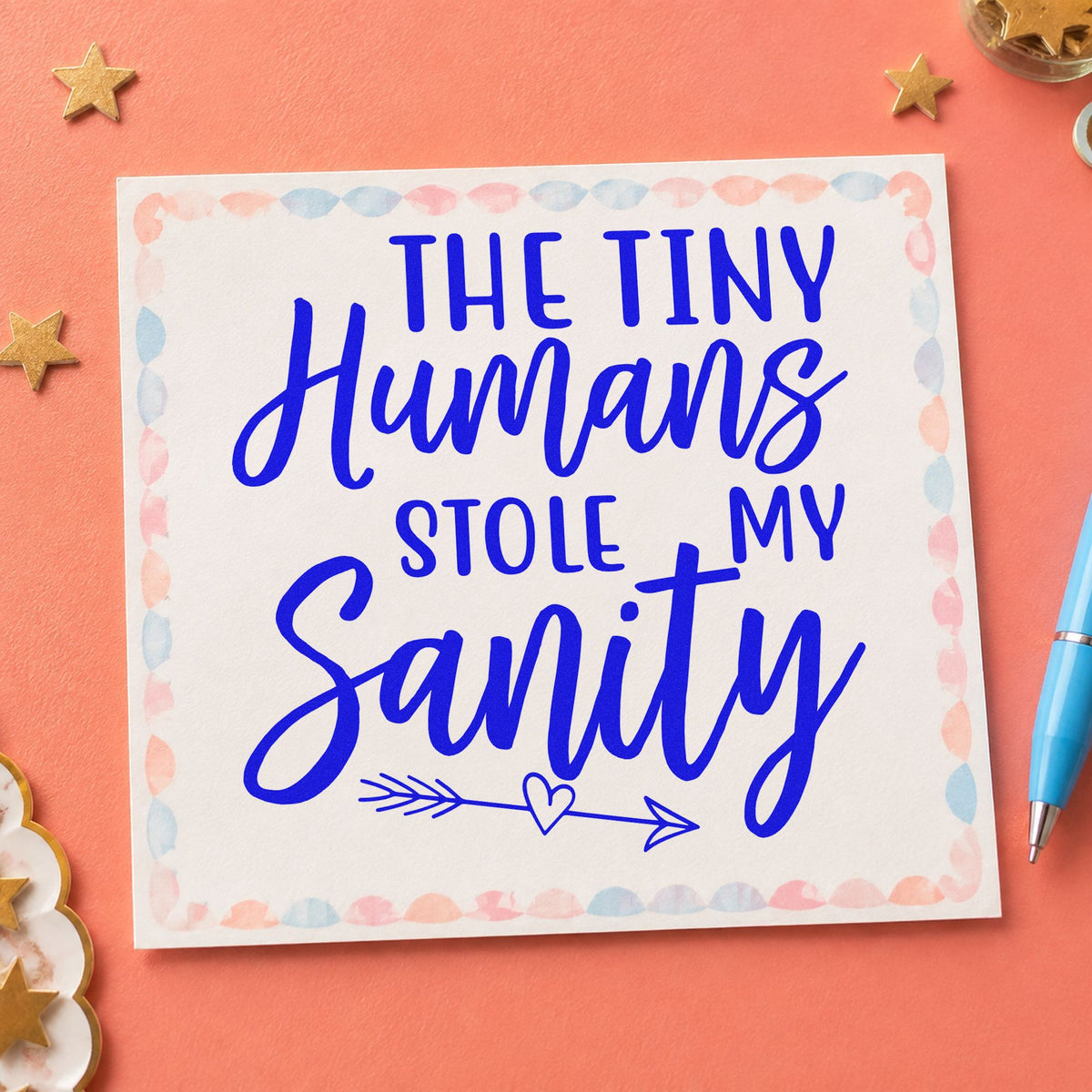 Tiny Humans Stole Sanity craft stamp in blue ink on cardstock, an easy option for pajama hem panels.