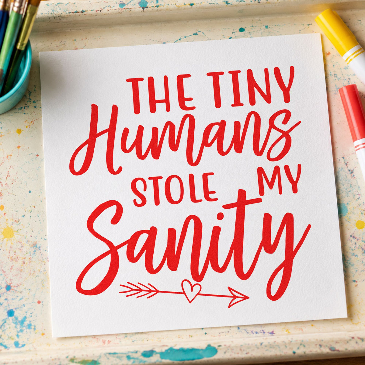 Tiny Humans Stole Sanity rubber stamp shown in red ink, stamped for projects such as half term notes.