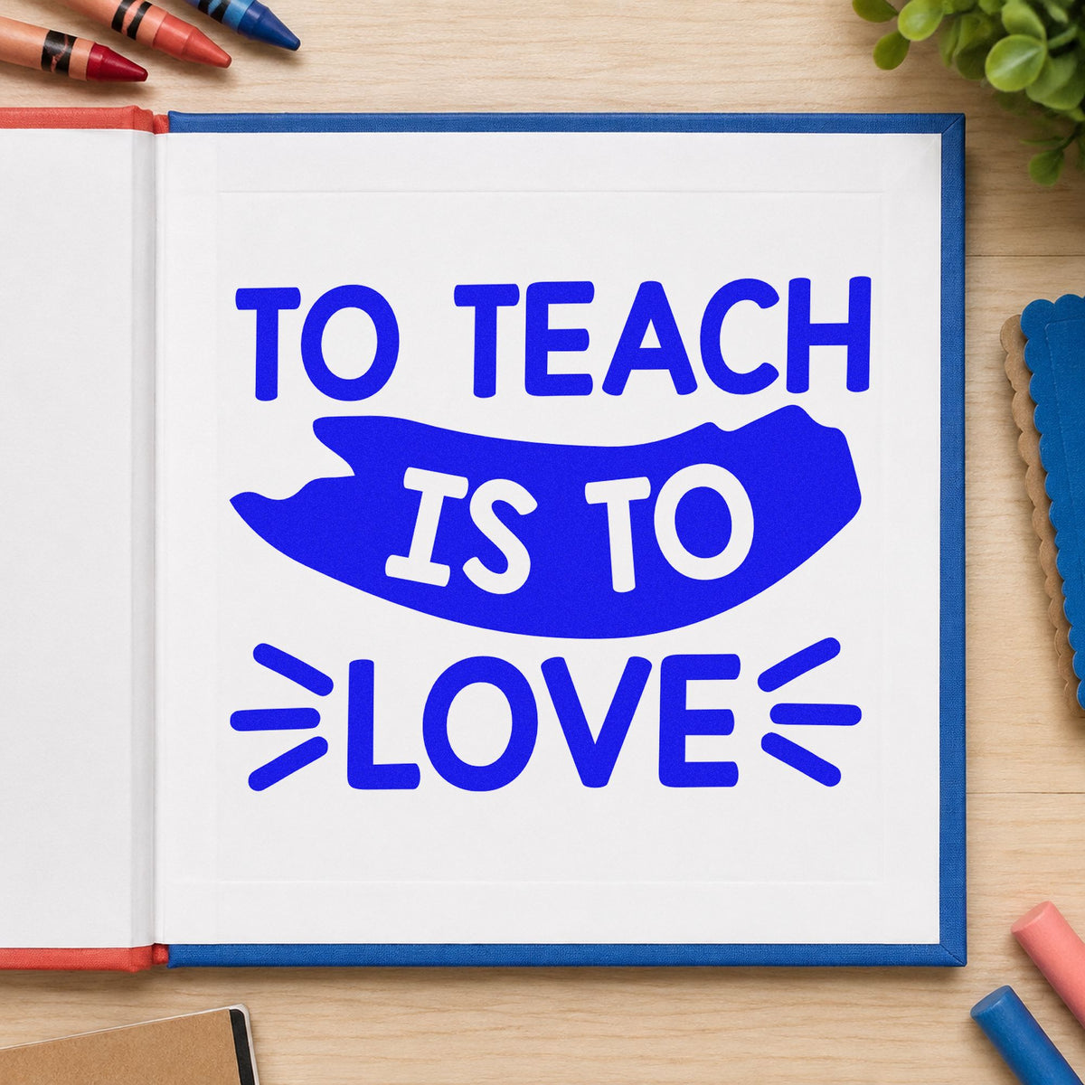 To Teach Is To Love craft stamp imprinted in blue ink on paper, a design suited to blessing card seals.