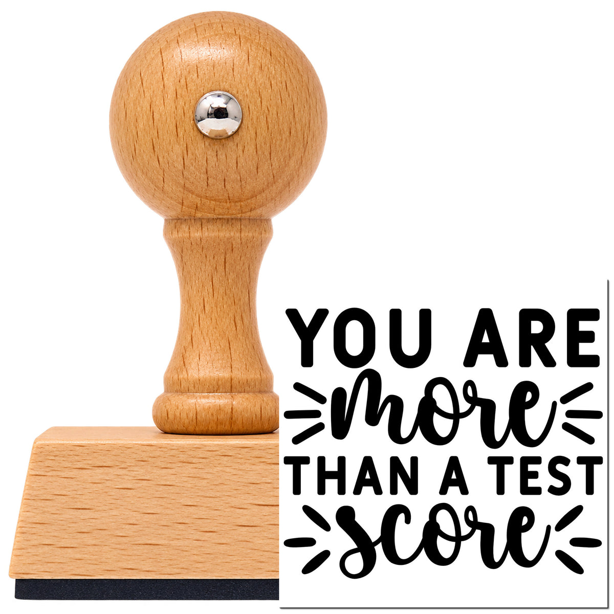 You Are More Than A Test Score Vintage Pro rubber stamp in European beech wood with a round knob handle, shown beside its black imprint.