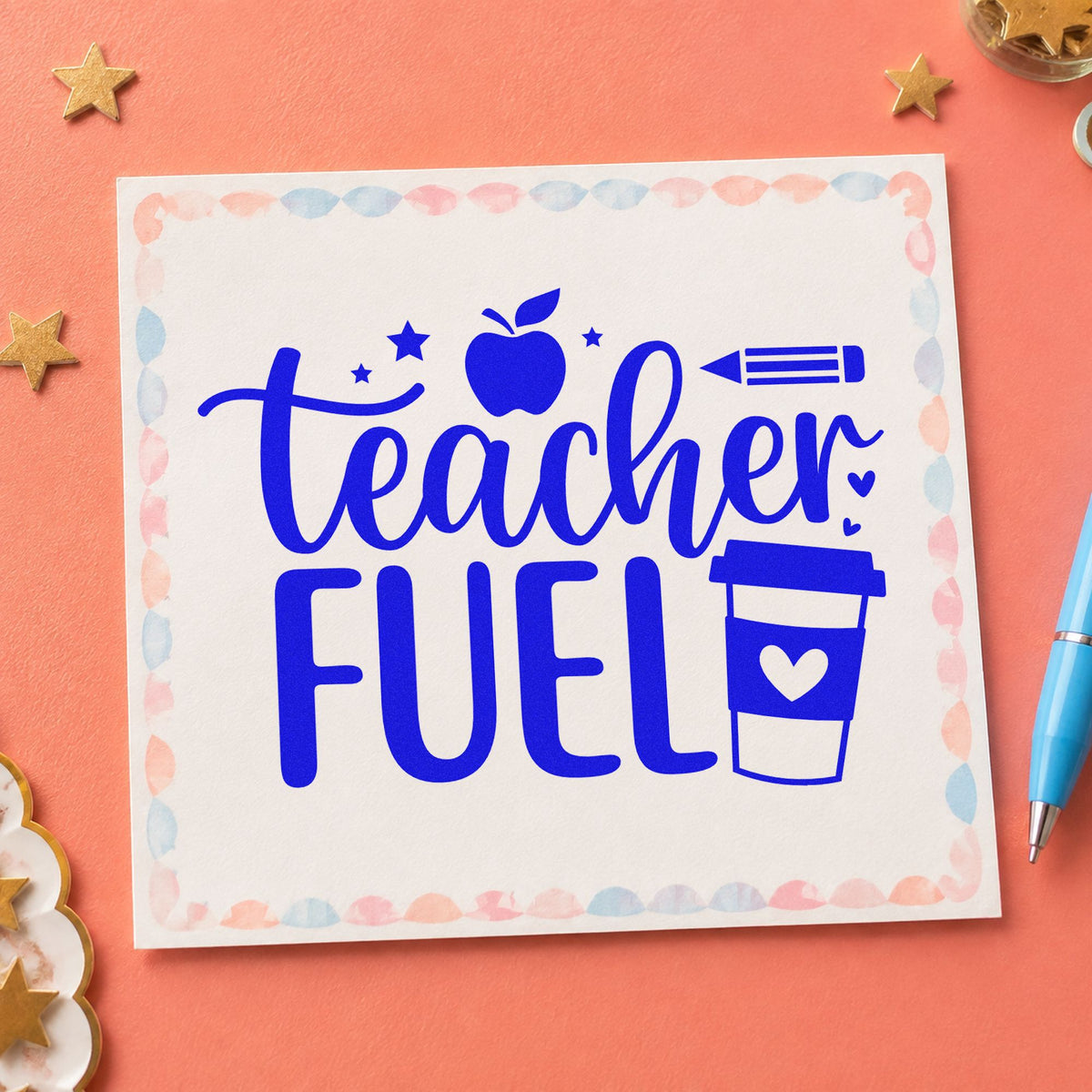 Teacher Fuel Coffee Cup craft stamp imprinted in blue ink on paper, a design suited to hamper lid seals.