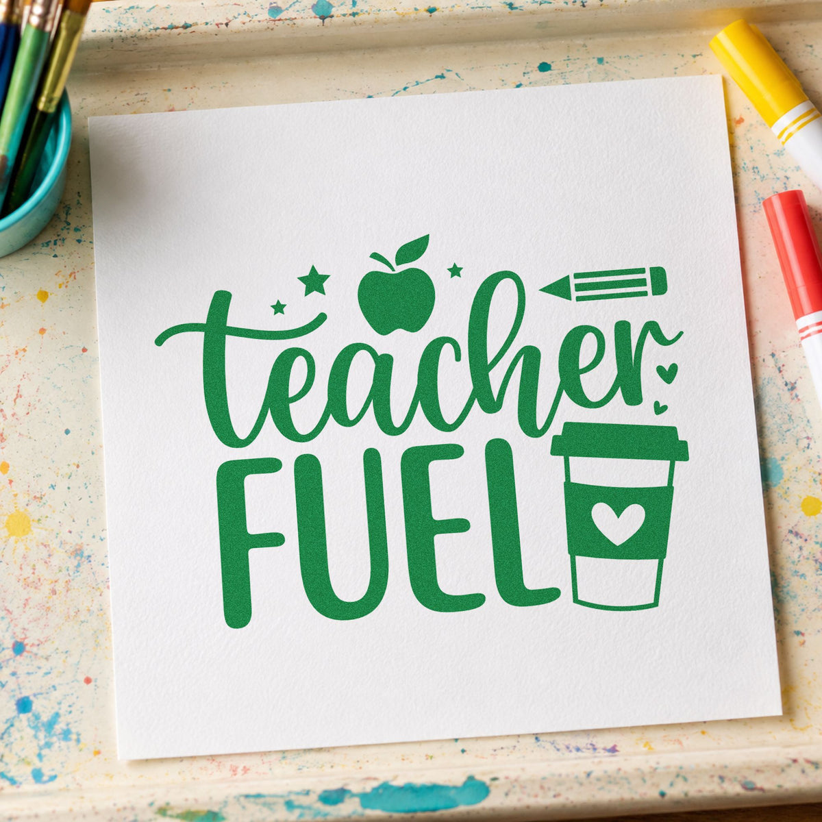 Teacher Fuel Coffee Cup craft stamp imprint in green ink on a handmade project, one idea being framed supply nook.
