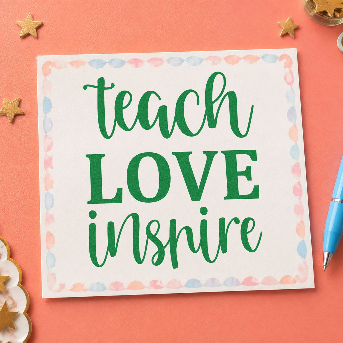 Teach Love Inspire Simple Script craft stamp imprint in green ink on a handmade project, one idea being award citation pages.