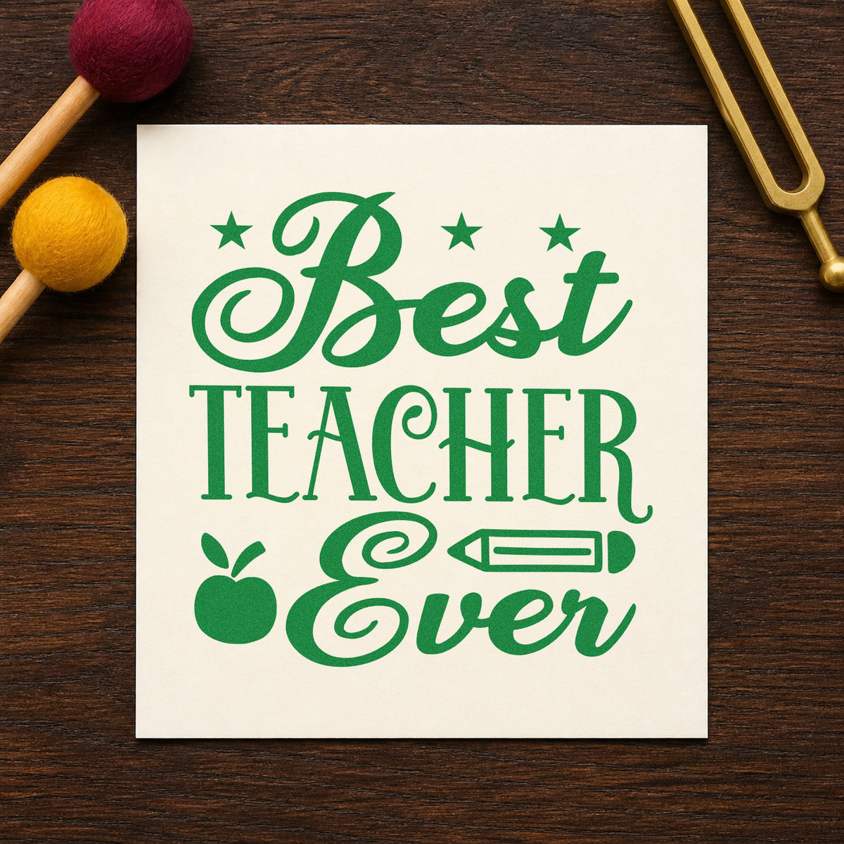 Best Teacher Ever Stars craft stamp imprint in green ink on a handmade project, one idea being framed class photo.