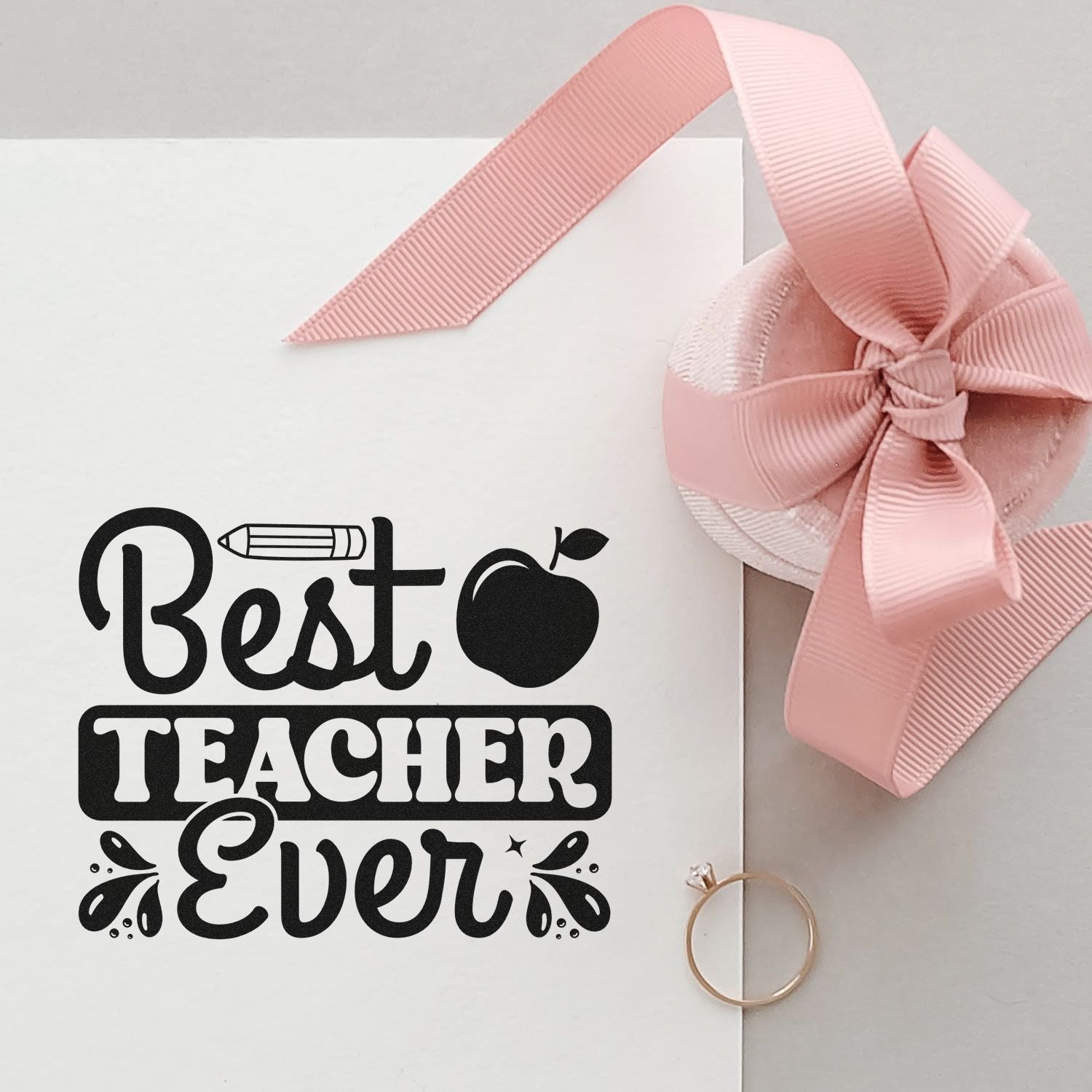 Best Teacher Ever rubber stamp design for teacher appreciation gifts, shown on white paper with pink ribbon.