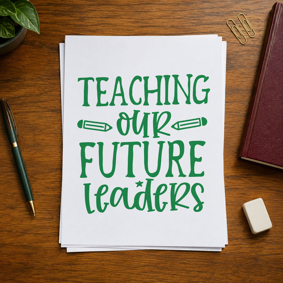Teaching Our Future Leaders craft stamp imprint in green ink on a handmade project, one idea being framed training room.