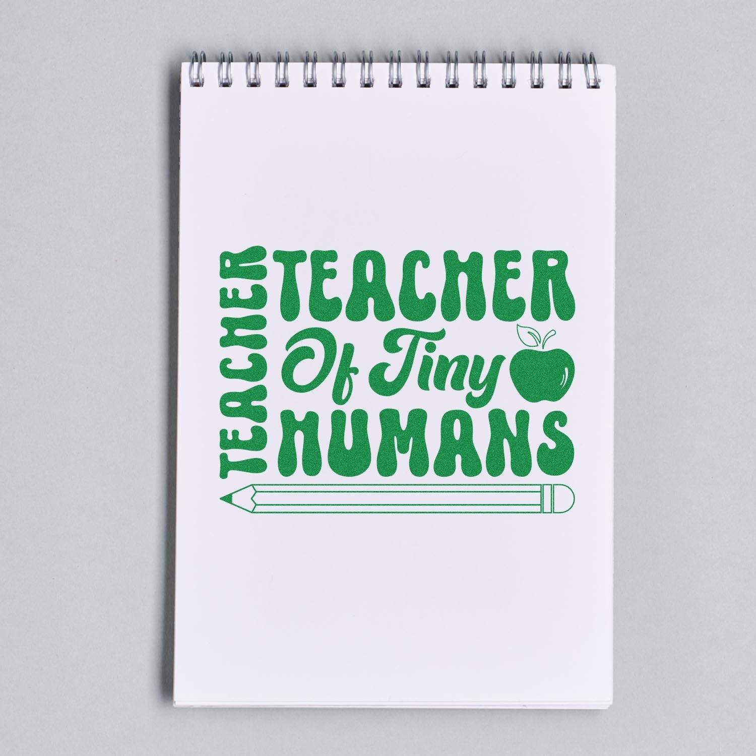 Teacher of Tiny Humans rubber stamp design in green, with apple and pencil, perfect for classroom notes and teacher gifts.