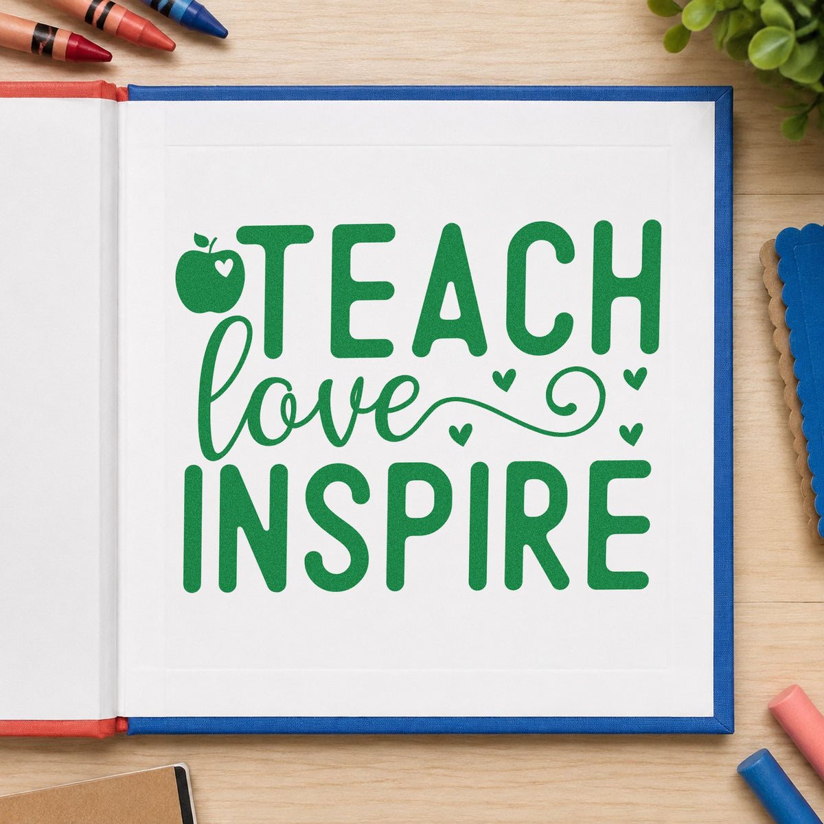 Teach Love Inspire Apple Hearts craft stamp imprint in green ink on a handmade project, one idea being nature diary pages.