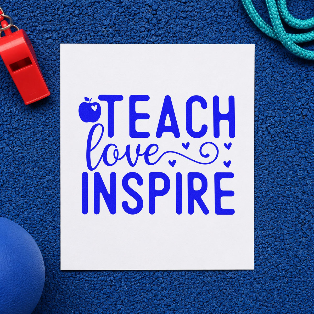 Teach Love Inspire Apple Hearts craft stamp imprinted in blue ink on paper, a design suited to seed pack seals.