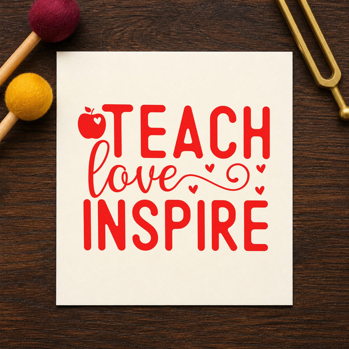 Teach Love Inspire Apple Hearts rubber stamp shown in red ink, stamped for projects such as growing term notes.