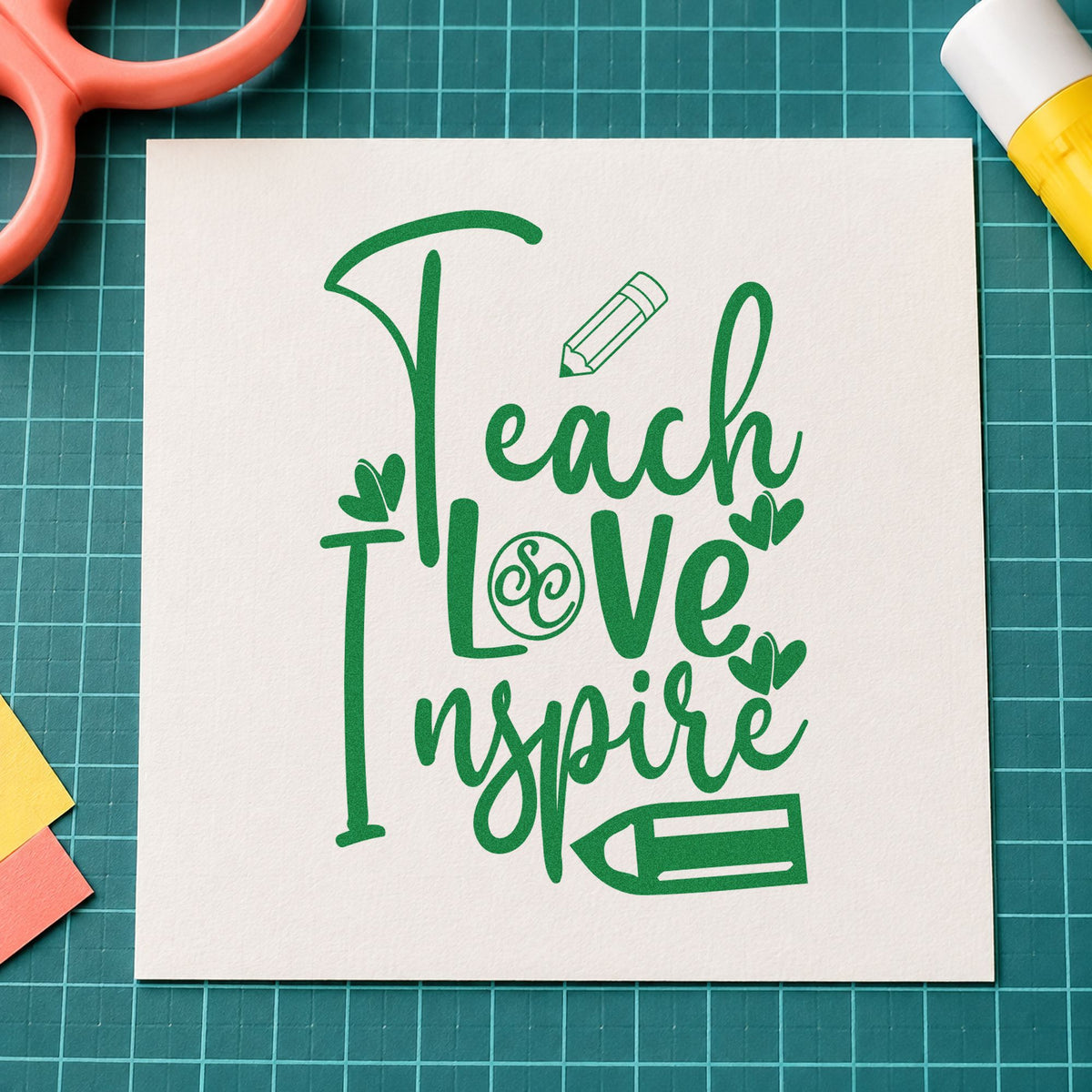Teach Love Inspire Pencil Flourish craft stamp imprint in green ink on a handmade project, one idea being monogram pages.