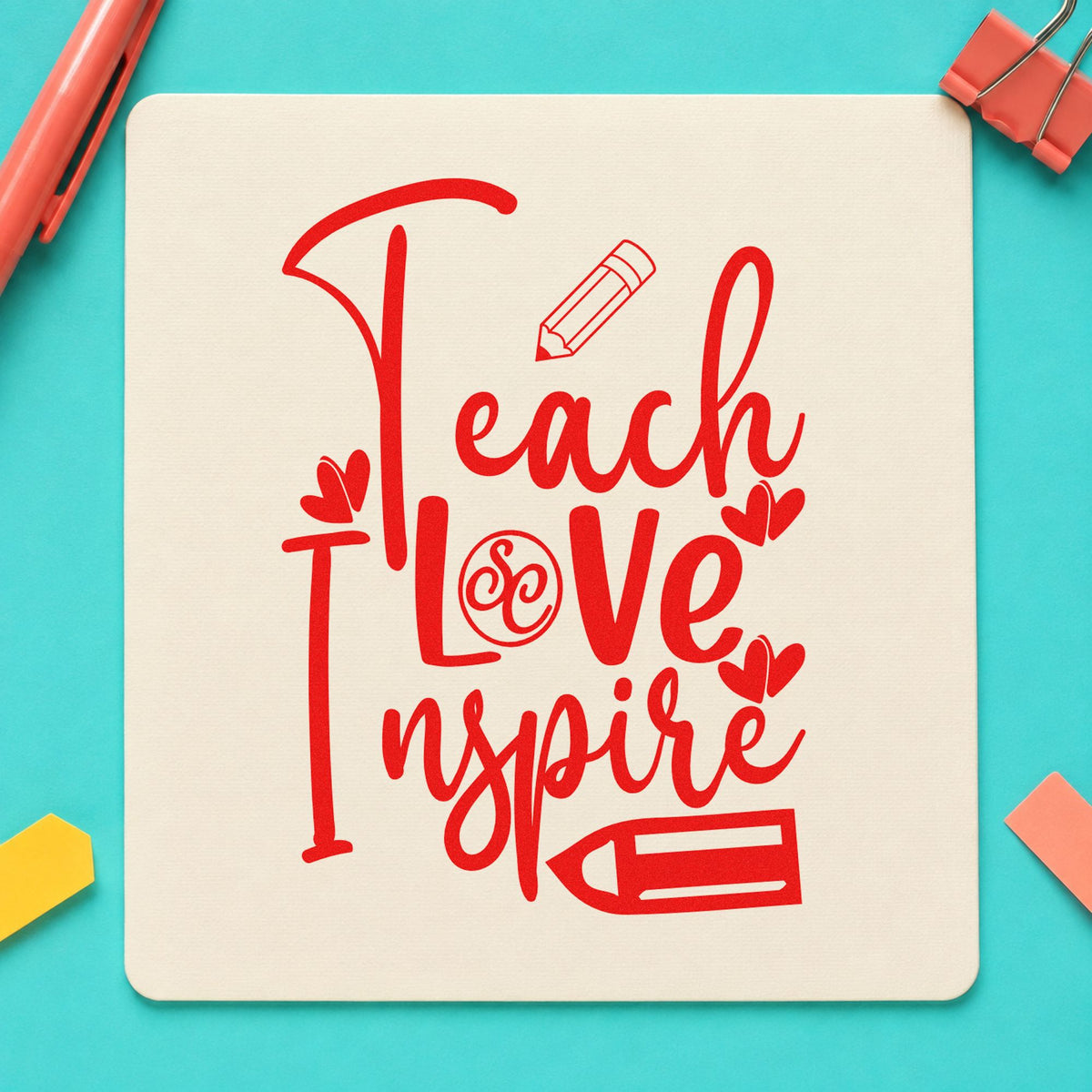 Teach Love Inspire Pencil Flourish rubber stamp shown in red ink, stamped for projects such as type class notes.